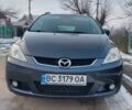 Серый Мазда 5, объемом двигателя 2 л и пробегом 266 тыс. км за 5504 $, фото 1 на Automoto.ua