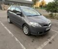 Серый Мазда 5, объемом двигателя 2 л и пробегом 226 тыс. км за 5200 $, фото 1 на Automoto.ua