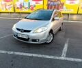 Серый Мазда 5, объемом двигателя 2 л и пробегом 319 тыс. км за 4000 $, фото 1 на Automoto.ua