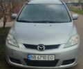 Серый Мазда 5, объемом двигателя 2 л и пробегом 350 тыс. км за 3500 $, фото 1 на Automoto.ua