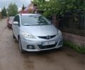 Серый Мазда 5, объемом двигателя 2 л и пробегом 262 тыс. км за 5200 $, фото 1 на Automoto.ua