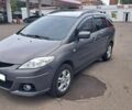 Серый Мазда 5, объемом двигателя 2 л и пробегом 300 тыс. км за 5499 $, фото 1 на Automoto.ua