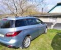 Серый Мазда 5, объемом двигателя 2 л и пробегом 94 тыс. км за 9000 $, фото 1 на Automoto.ua