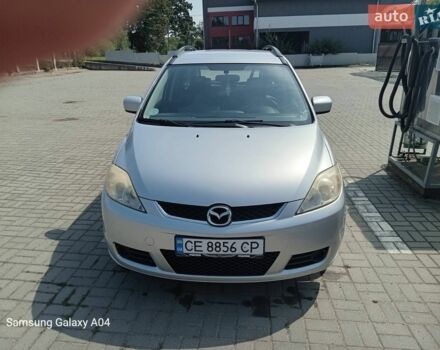 Серый Мазда 5, объемом двигателя 1.8 л и пробегом 265 тыс. км за 4900 $, фото 1 на Automoto.ua