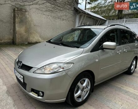 Серый Мазда 5, объемом двигателя 2 л и пробегом 303 тыс. км за 4650 $, фото 1 на Automoto.ua