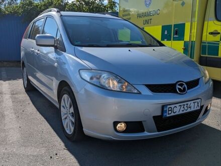 Серый Мазда 5, объемом двигателя 2 л и пробегом 239 тыс. км за 6000 $, фото 1 на Automoto.ua