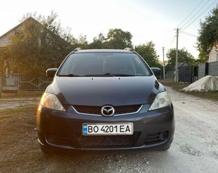 Сірий Мазда 5, об'ємом двигуна 2 л та пробігом 200 тис. км за 6299 $, фото 1 на Automoto.ua
