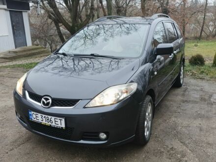 Серый Мазда 5, объемом двигателя 1.8 л и пробегом 258 тыс. км за 4500 $, фото 1 на Automoto.ua