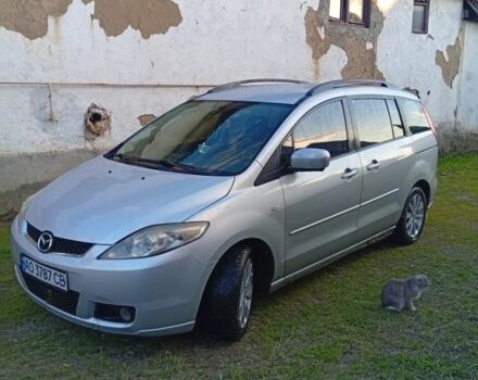Серый Мазда 5, объемом двигателя 2 л и пробегом 350 тыс. км за 3500 $, фото 1 на Automoto.ua
