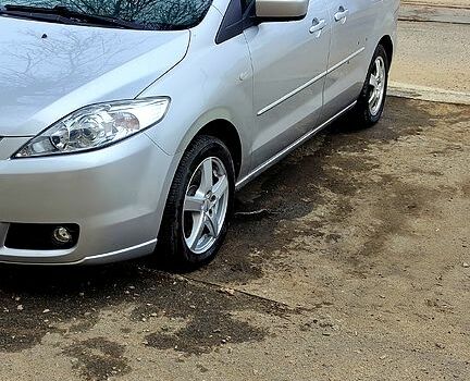 Серый Мазда 5, объемом двигателя 2 л и пробегом 250 тыс. км за 5000 $, фото 1 на Automoto.ua