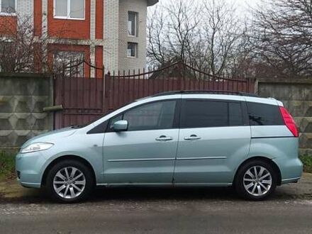 Серый Мазда 5, объемом двигателя 2 л и пробегом 232 тыс. км за 4400 $, фото 1 на Automoto.ua