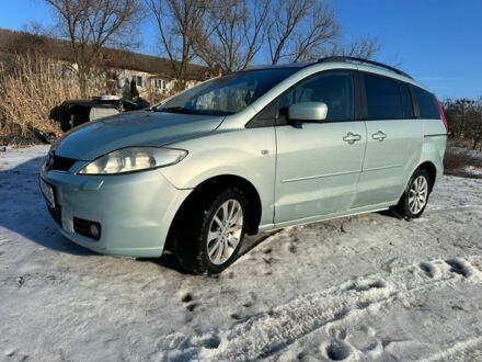 Серый Мазда 5, объемом двигателя 2 л и пробегом 299 тыс. км за 4600 $, фото 1 на Automoto.ua