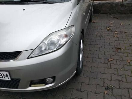 Серый Мазда 5, объемом двигателя 2 л и пробегом 295 тыс. км за 4000 $, фото 1 на Automoto.ua