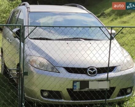 Серый Мазда 5, объемом двигателя 2.01 л и пробегом 145 тыс. км за 7000 $, фото 1 на Automoto.ua