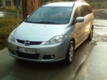 Серый Мазда 5, объемом двигателя 2 л и пробегом 230 тыс. км за 6200 $, фото 1 на Automoto.ua