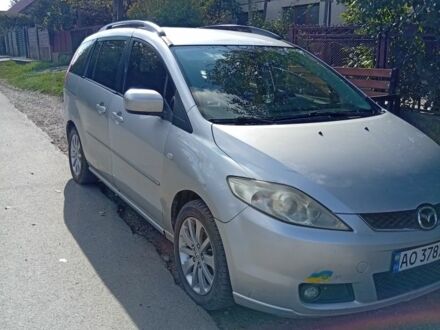 Серый Мазда 5, объемом двигателя 2 л и пробегом 320 тыс. км за 3000 $, фото 1 на Automoto.ua
