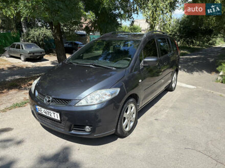 Серый Мазда 5, объемом двигателя 2 л и пробегом 255 тыс. км за 5800 $, фото 1 на Automoto.ua