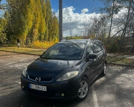 Серый Мазда 5, объемом двигателя 2 л и пробегом 280 тыс. км за 4600 $, фото 1 на Automoto.ua