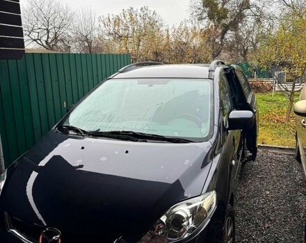 Серый Мазда 5, объемом двигателя 2 л и пробегом 174 тыс. км за 6550 $, фото 1 на Automoto.ua