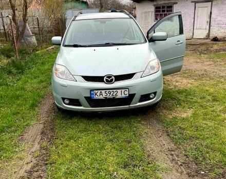 Серый Мазда 5, объемом двигателя 2 л и пробегом 225 тыс. км за 3750 $, фото 1 на Automoto.ua