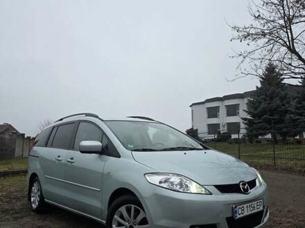 Серый Мазда 5, объемом двигателя 2 л и пробегом 286 тыс. км за 4300 $, фото 1 на Automoto.ua