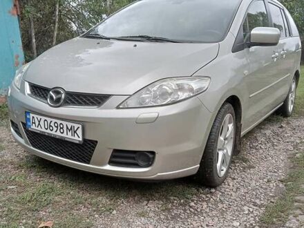 Серый Мазда 5, объемом двигателя 1.8 л и пробегом 213 тыс. км за 5548 $, фото 1 на Automoto.ua