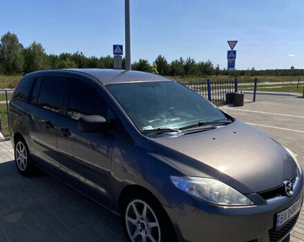 Серый Мазда 5, объемом двигателя 2 л и пробегом 262 тыс. км за 5100 $, фото 1 на Automoto.ua