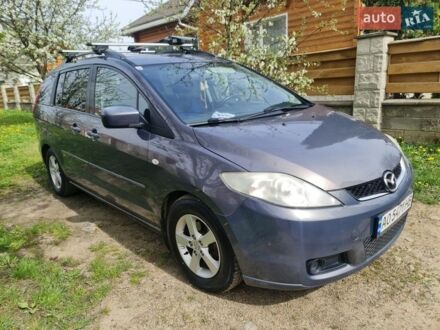 Серый Мазда 5, объемом двигателя 2 л и пробегом 270 тыс. км за 4200 $, фото 1 на Automoto.ua