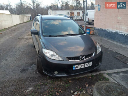 Серый Мазда 5, объемом двигателя 2 л и пробегом 280 тыс. км за 6000 $, фото 1 на Automoto.ua