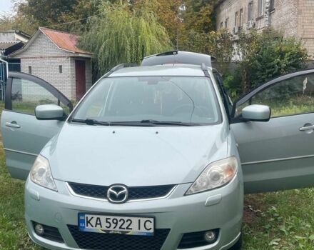 Серый Мазда 5, объемом двигателя 2 л и пробегом 230 тыс. км за 3999 $, фото 1 на Automoto.ua