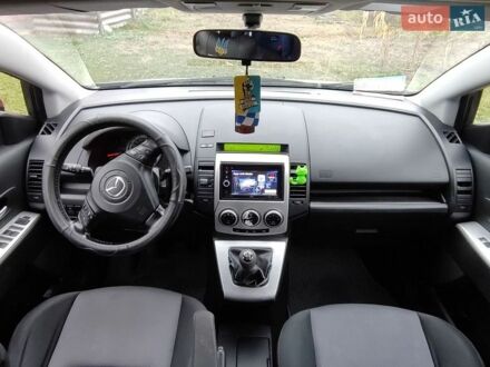 Серый Мазда 5, объемом двигателя 2 л и пробегом 240 тыс. км за 3100 $, фото 1 на Automoto.ua