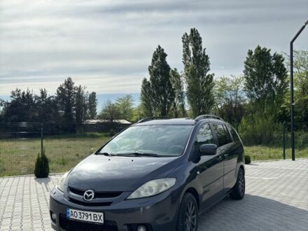 Серый Мазда 5, объемом двигателя 2 л и пробегом 376 тыс. км за 4700 $, фото 1 на Automoto.ua