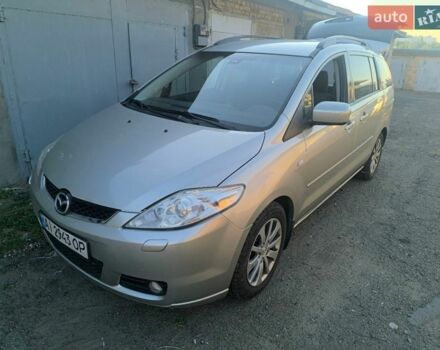Серый Мазда 5, объемом двигателя 2 л и пробегом 200 тыс. км за 4700 $, фото 1 на Automoto.ua