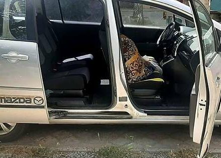Серый Мазда 5, объемом двигателя 2 л и пробегом 285 тыс. км за 4500 $, фото 1 на Automoto.ua