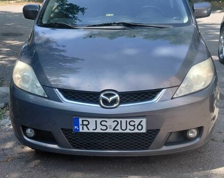 Сірий Мазда 5, об'ємом двигуна 2 л та пробігом 326 тис. км за 4996 $, фото 1 на Automoto.ua