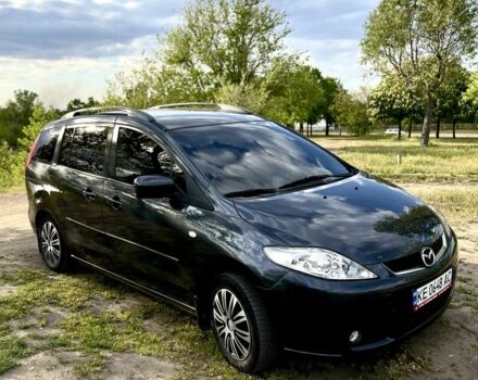 Серый Мазда 5, объемом двигателя 1.8 л и пробегом 255 тыс. км за 5450 $, фото 1 на Automoto.ua