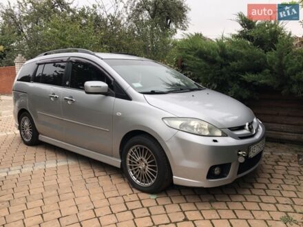 Серый Мазда 5, объемом двигателя 2 л и пробегом 200 тыс. км за 3500 $, фото 1 на Automoto.ua