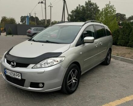 Серый Мазда 5, объемом двигателя 2 л и пробегом 210 тыс. км за 5800 $, фото 1 на Automoto.ua