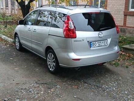 Серый Мазда 5, объемом двигателя 2 л и пробегом 236 тыс. км за 5200 $, фото 1 на Automoto.ua