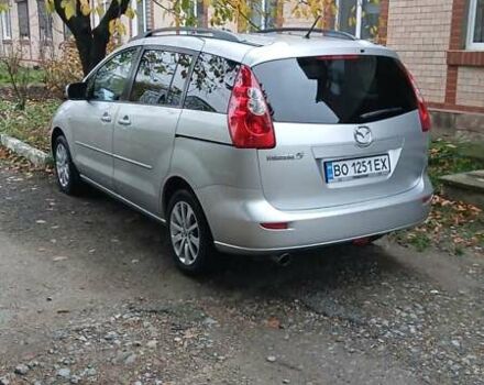 Серый Мазда 5, объемом двигателя 2 л и пробегом 236 тыс. км за 5200 $, фото 1 на Automoto.ua