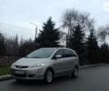 Серый Мазда 5, объемом двигателя 2 л и пробегом 172 тыс. км за 7700 $, фото 1 на Automoto.ua