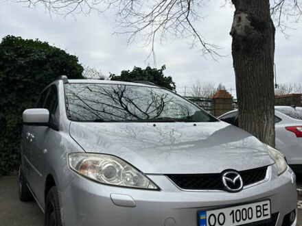 Серый Мазда 5, объемом двигателя 2 л и пробегом 257 тыс. км за 5700 $, фото 1 на Automoto.ua