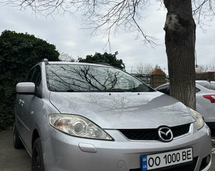 Серый Мазда 5, объемом двигателя 2 л и пробегом 257 тыс. км за 5700 $, фото 1 на Automoto.ua