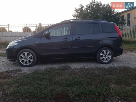 Серый Мазда 5, объемом двигателя 2 л и пробегом 241 тыс. км за 5500 $, фото 1 на Automoto.ua