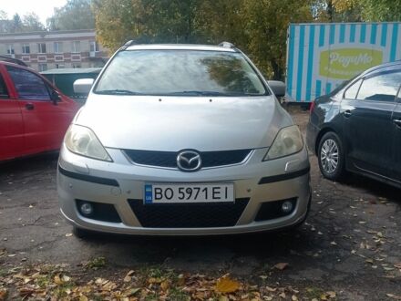 Серый Мазда 5, объемом двигателя 2 л и пробегом 310 тыс. км за 3300 $, фото 1 на Automoto.ua