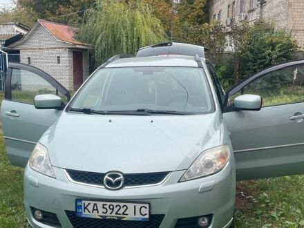 Серый Мазда 5, объемом двигателя 2 л и пробегом 230 тыс. км за 3999 $, фото 1 на Automoto.ua