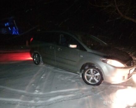 Сірий Мазда 5, об'ємом двигуна 2 л та пробігом 209 тис. км за 2800 $, фото 1 на Automoto.ua