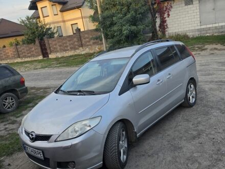 Серый Мазда 5, объемом двигателя 2 л и пробегом 350 тыс. км за 3361 $, фото 1 на Automoto.ua