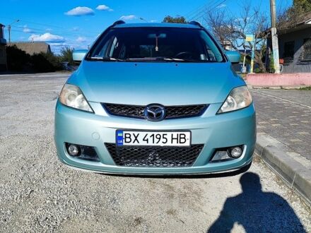 Серый Мазда 5, объемом двигателя 2 л и пробегом 199 тыс. км за 4900 $, фото 1 на Automoto.ua