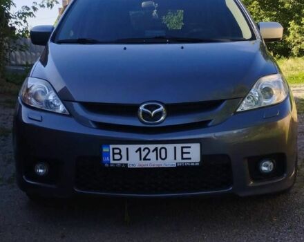 Серый Мазда 5, объемом двигателя 2 л и пробегом 226 тыс. км за 5000 $, фото 1 на Automoto.ua